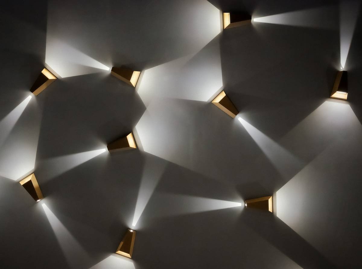 Modern cool 3d art ideas installed in a sunlit living room with layered wood and acrylic panels creating dynamic shadows